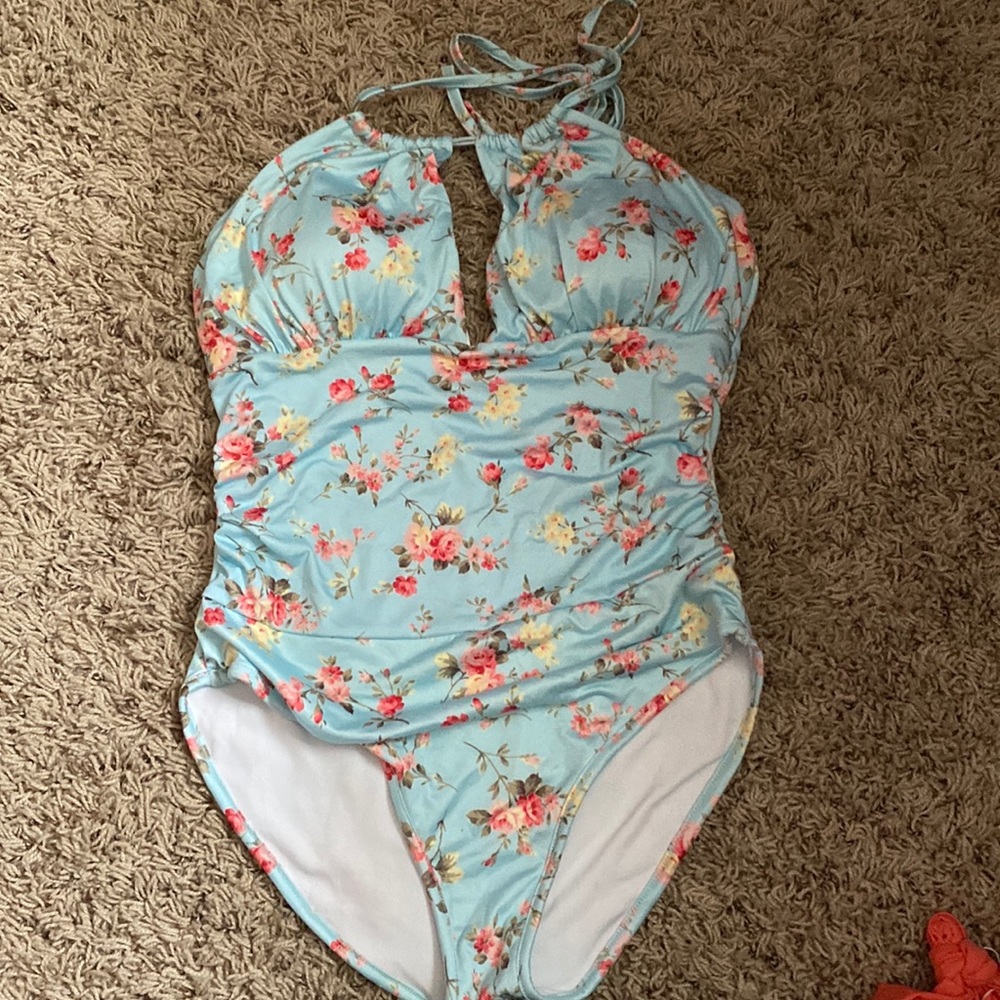 One piece swim suit.